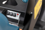 Close view of the DC Tromb 600 Twin control panel on the motor housing, three rocker switches and a red filter indicator lamp