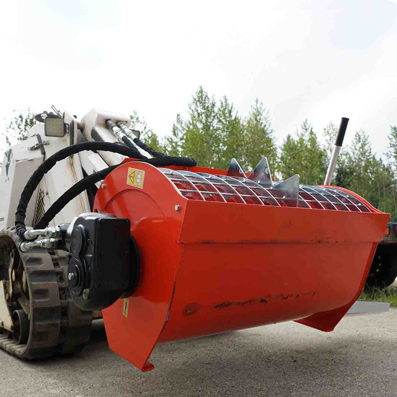 Empty Hurricane mini mixer mounted on a white mini skid steer on pavement, with the mesh grate top open to the internal mixing paddles