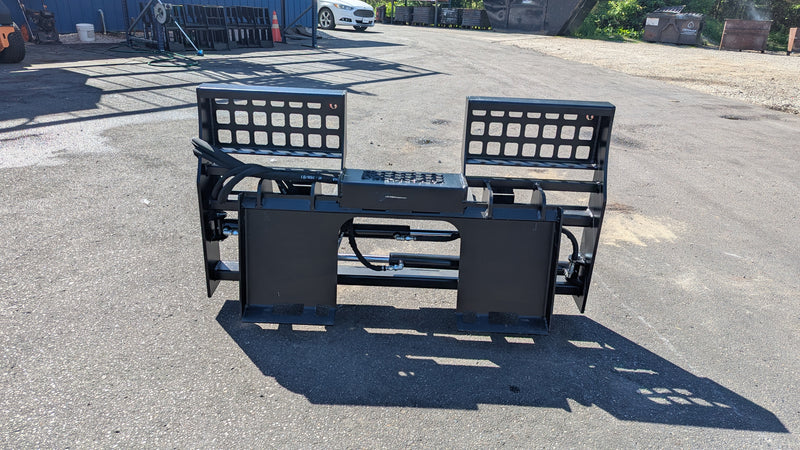 Glacier hydraulic pallet forks, detached on pavement, front view of the hydraulic side-shift frame and fork backrests
