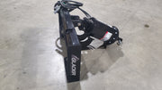Glacier auger drive at a low angle on a shop floor, showing the frame side plate, drive head, and output shaft