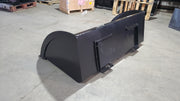 Glacier Extreme high-capacity material bucket, rear three-quarter view showing the quick-attach plate and mounting brackets