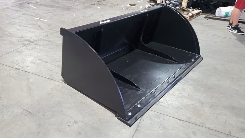 Glacier Extreme high-capacity material bucket, angled view into the shell showing the wear strips along the floor