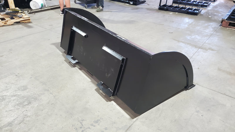 Glacier Extreme high-capacity material bucket seen from behind and above, showing the full back panel and the rolled top