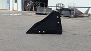 Glacier Extreme rock bucket on pavement, side view of the spaced tines