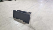Glacier Extreme stump bucket on a shop floor, rear view showing the quick-attach mounting plate and narrow profile