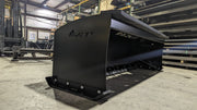 Glacier HD snow pusher in a shop, angled view showing the boxed side plate and the bolted cutting edge