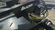 Glacier rock and brush grapple, close view of the cylinder mount, hose routing and the frame plate