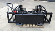 Glacier root and brush grapple seen from behind, showing the mount frame, cylinders and hose routing