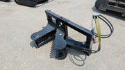 Glacier tree puller on pavement, three-quarter view showing the serrated jaws, cylinder, and hose