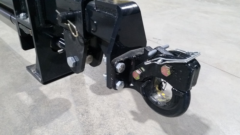 Glacier truss boom, close view of the boom tip hook and the mount plate on a shop floor