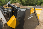 Close view of the back of the HitchDoc Push-Off Bucket, showing the hydraulic cylinder and hose that drive the extractor, the HitchDoc identification plate and the bolted quick-tach mount