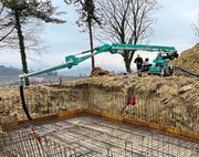 IMER Gerris 800 crawler concrete placing boom working on a jobsite