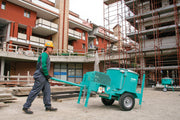 IMER Mix 360 towable vertical shaft paddle mixer, in use on a jobsite