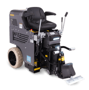 5700DL ride-on scraper with twin lift levers at the right hand and a front LED work light