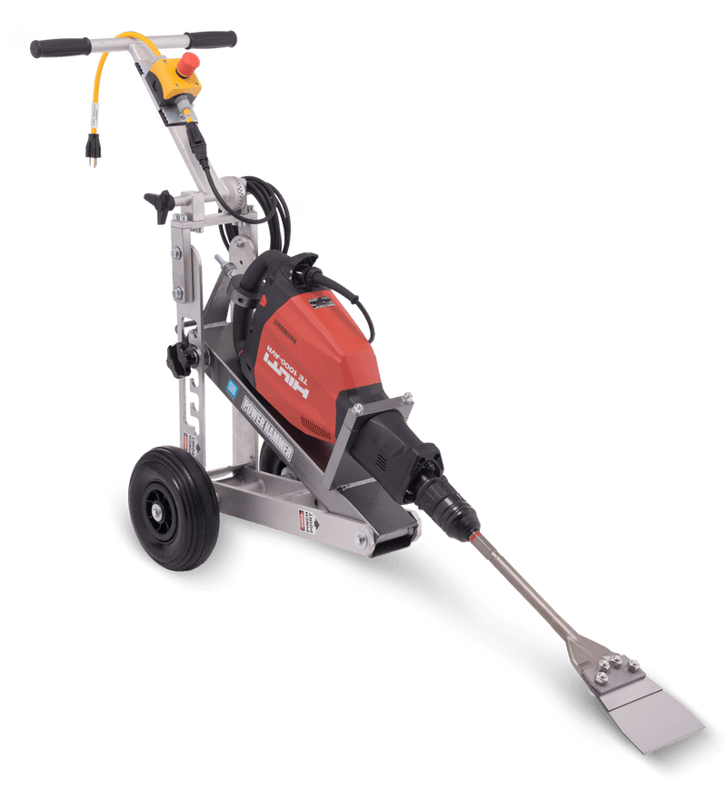 Power Hammer Trolley frame with a Hilti hammer mounted and a wide scraping blade at floor level