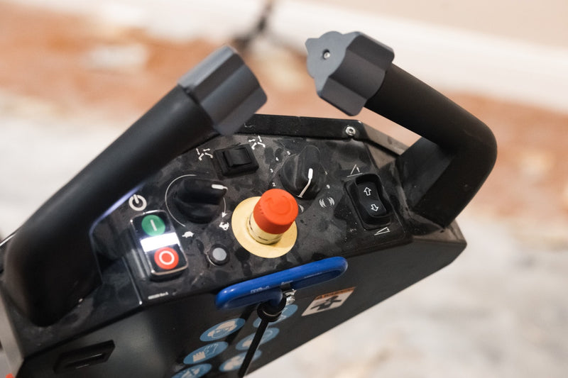 Rogue walk-behind scraper control head with the start and stop switches, emergency stop and speed dial
