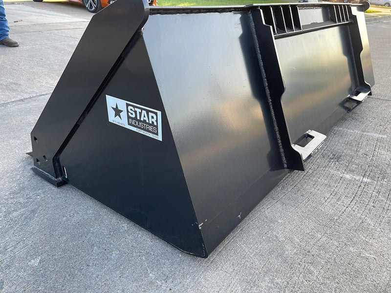 Rear of the extreme duty bucket showing the hat section across the top and the quick-tach plate