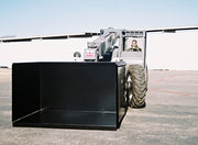 Telehandler carrying the trash hopper with the open face toward the camera