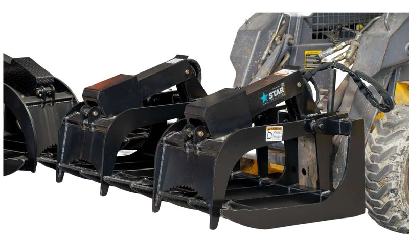Star Industries root grapple bucket on a skid steer, three grapple arms raised above the separated bottom tines