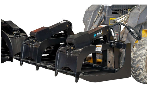 Star Industries root grapple bucket on a skid steer, three grapple arms raised above the separated bottom tines