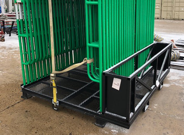 Scaffold pallet loaded with frames and strapped down, brace basket at the end