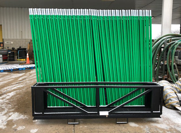 End view of a loaded scaffold pallet showing the frames stacked upright in the rack
