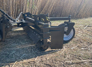 Power rake from the rear showing the manual pivot and both gauge wheels