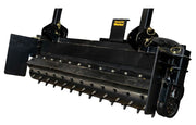 Power rake drum from the front showing the carbide teeth set in a spiral along its length