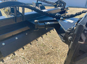 Top of the power rake showing the manual pivot linkage and the hydraulic hose run
