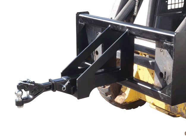 Trailer spotter mounted on a yellow skid steer, hitch adapter extended out from the frame