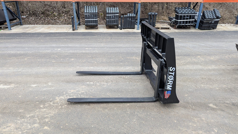 Storm 2000 pallet forks on pavement, side view of the frame and blades