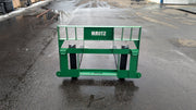 Storm 4500 pallet forks in John Deere green, straight-on rear view of the frame and the mount plate