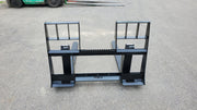 Storm 4500 pallet forks in black on pavement, angled view showing the tall frame and the carriage rail
