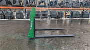 Storm 4500 pallet forks in John Deere green, side view showing the upright and the tine reach
