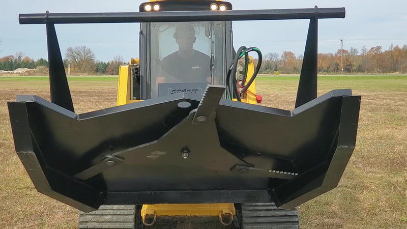 Storm 72 inch HD brush cutter, underside view of the deck showing the blade bar and the mounting bolts