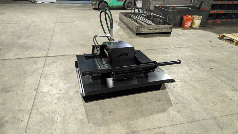 Storm 48 inch mini brush cutter on a shop floor, angled view of the deck and the drive housing
