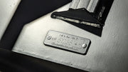 Storm 48 inch mini brush cutter, close view of the stamped serial plate on the deck frame