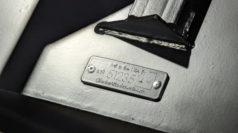 Storm 48 inch mini brush cutter, close view of the stamped serial plate on the deck frame