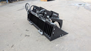 Storm rock and brush grapple on pavement, side view showing the tine bank and clamp