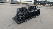 Storm rock and brush grapple on pavement, three-quarter view of the bolted side plates and tine frame