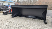 Storm box snow pusher on gravel, side view of the moldboard and boxed sides