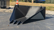 Storm stump bucket on gravel, three-quarter view of the V-body and serrated top