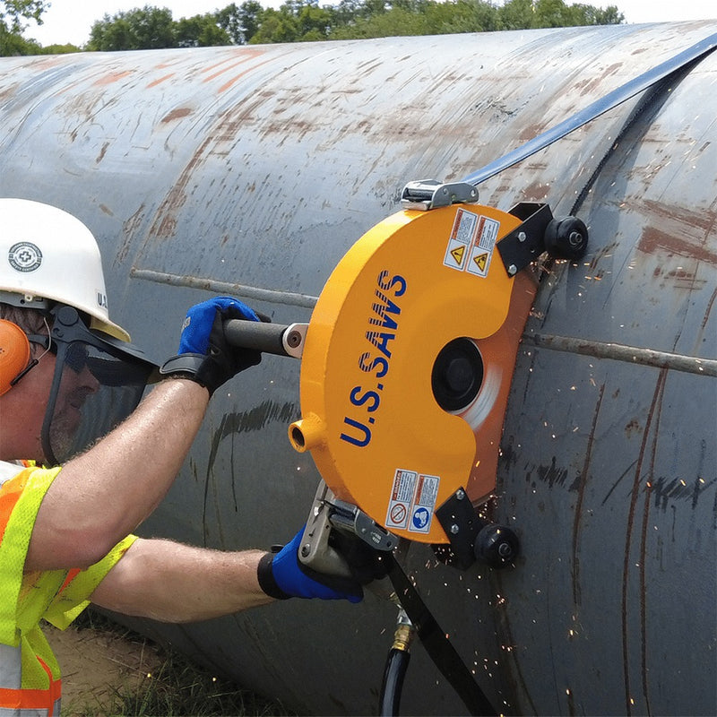 Big Belly saw cutting a large pipe with the strap assembly