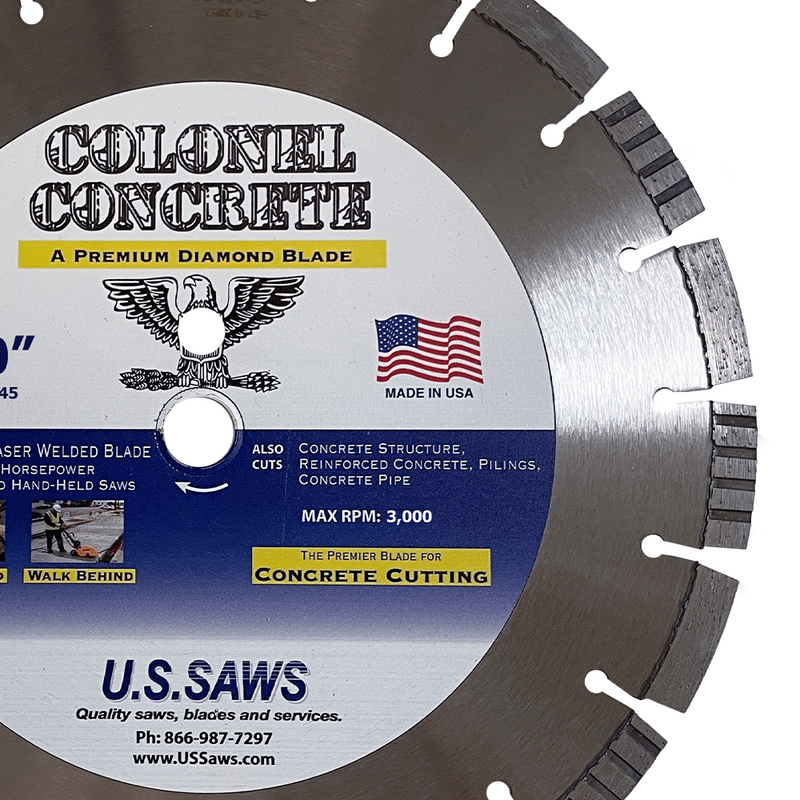 Colonel Concrete hub label photographed against the brushed core of the largest blade