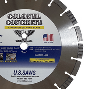 Close view of the Colonel Concrete hub label, eagle crest and made in USA flag beside the blue concrete cutting band