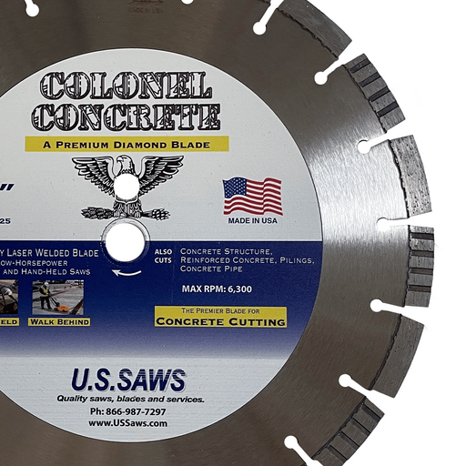 Close view of the Colonel Concrete hub label, eagle crest and made in USA flag beside the blue concrete cutting band
