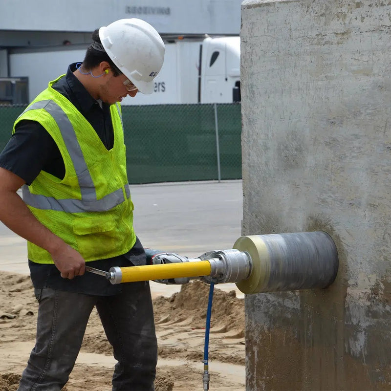 Core EZ drilling a core hole in a concrete wall