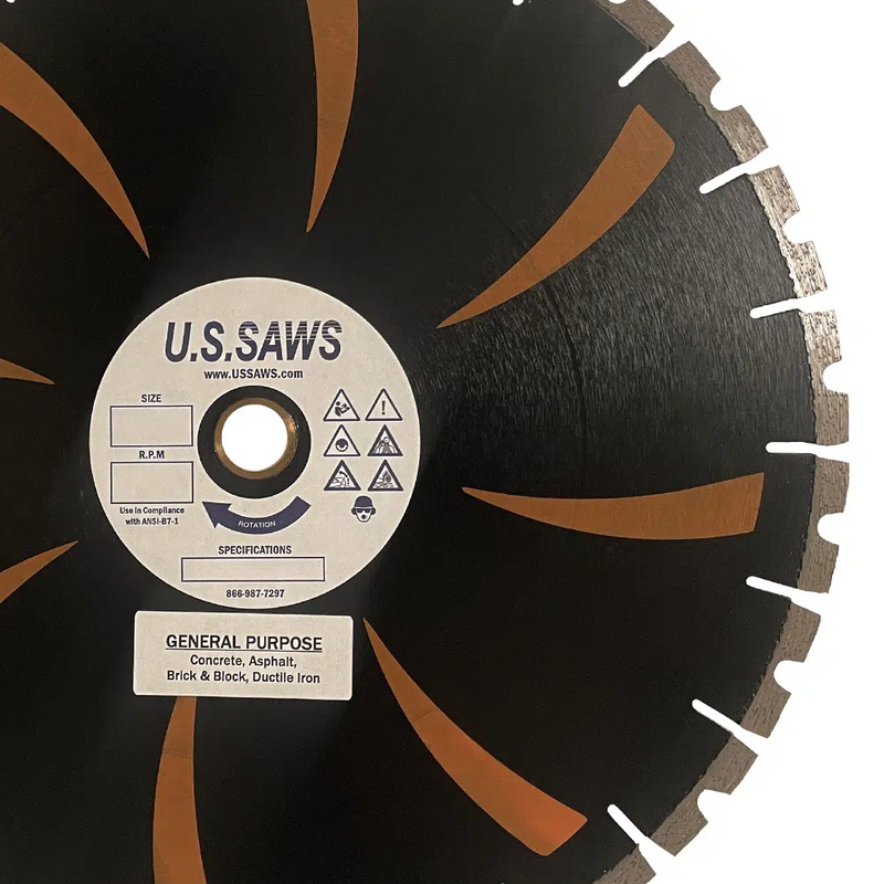Black multipurpose blade at closer range, hub label reading concrete, asphalt, brick, block and ductile iron