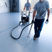 Two operators filling joints with the Dual Component Polymer Pump