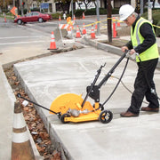 FSB-150 cutting a curb line inside traffic cones